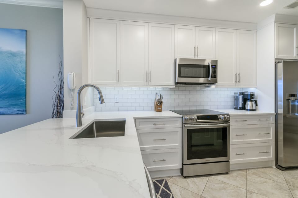 All new appliances, cabinets, quartz countertops, etc.