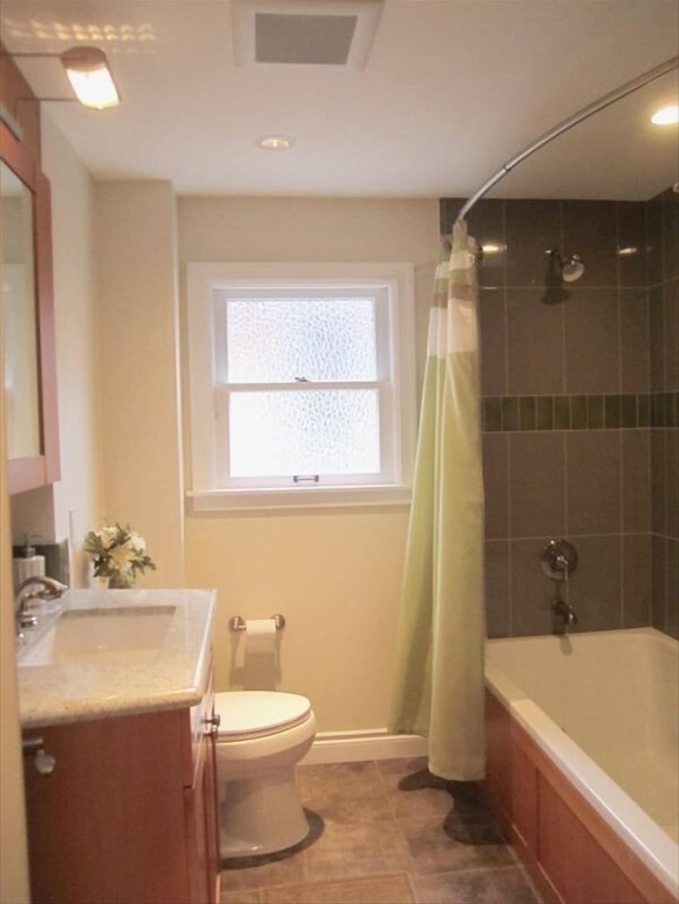 Bath 1: Huge 70" tub with tile surround, heated floors and large granite sink
