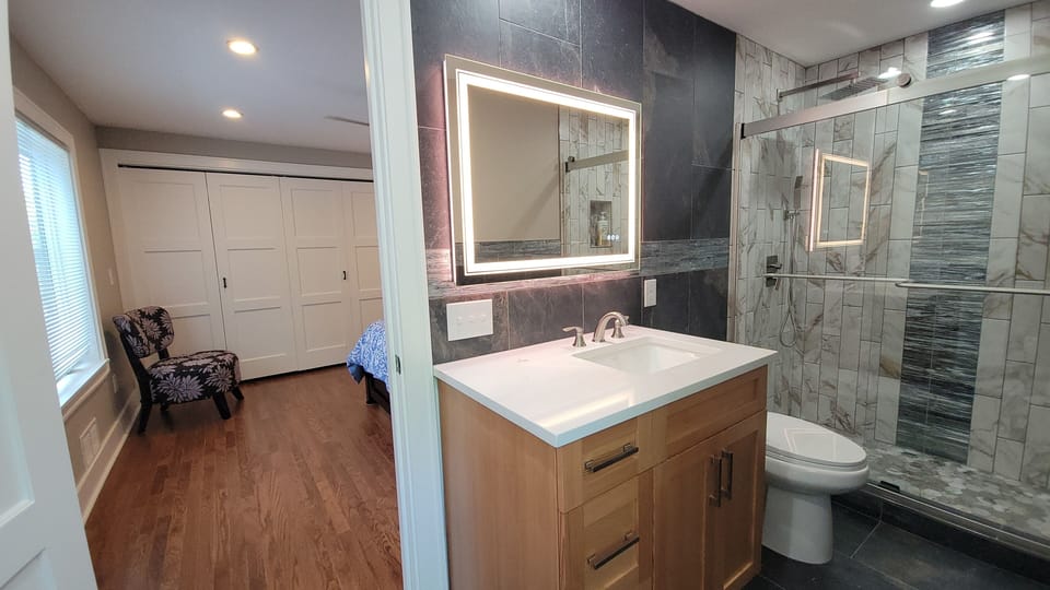 Bath 2 - Ensuite walk-in shower with antifog lighted mirror for Bedroom 1