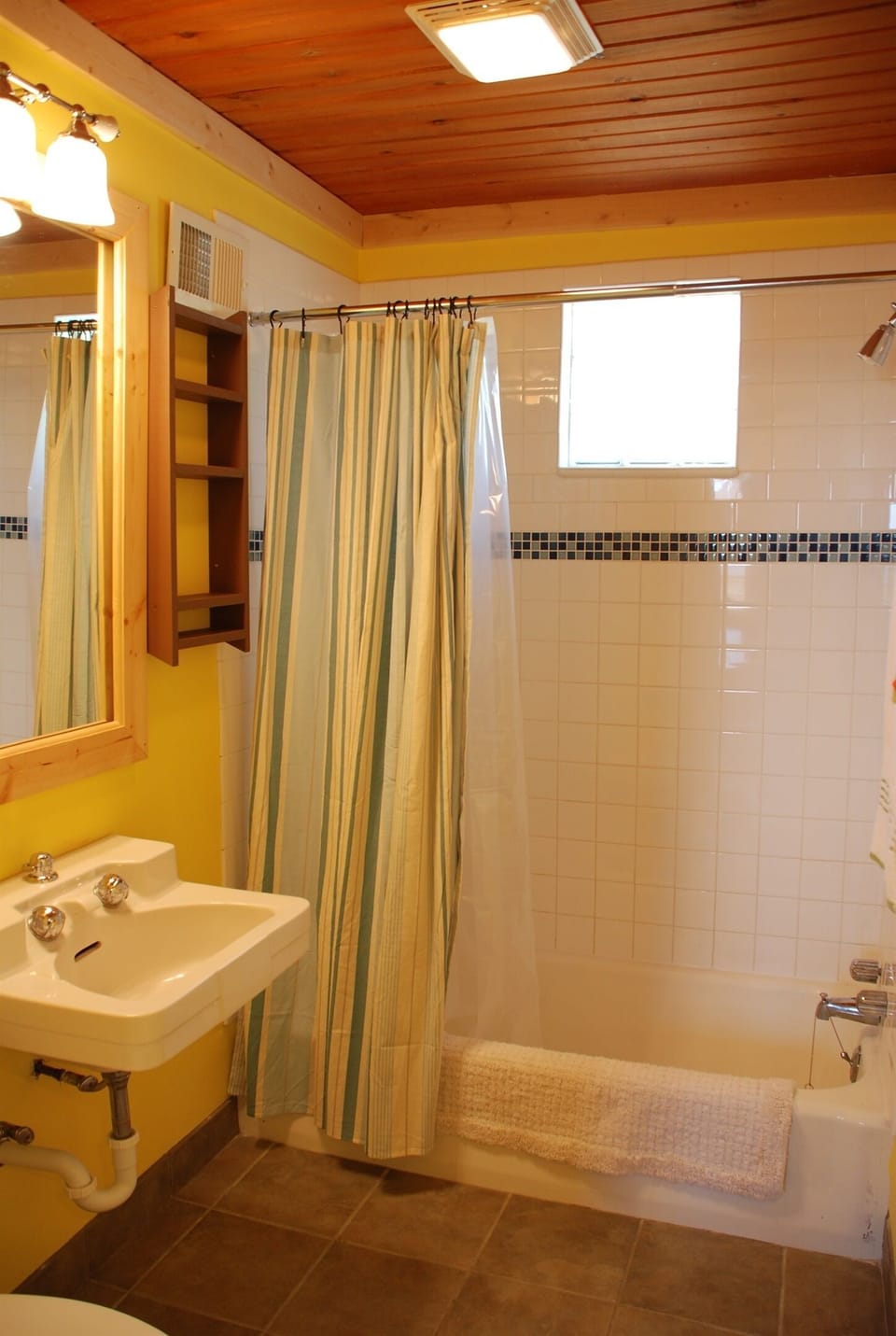 Modern tile bathroom #1 with tub and shower.