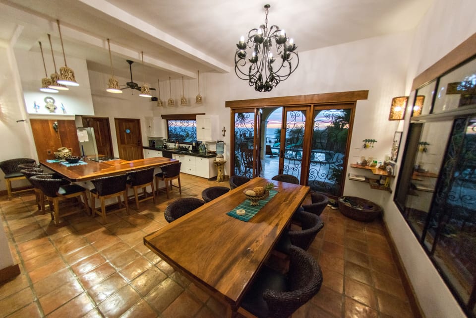 local hand made table; three huge wrought iron chandeliers
