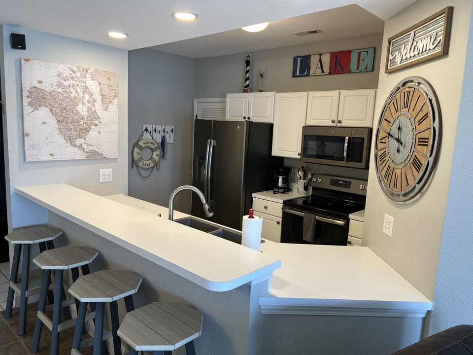 Updated appliances with counter seating for 4.