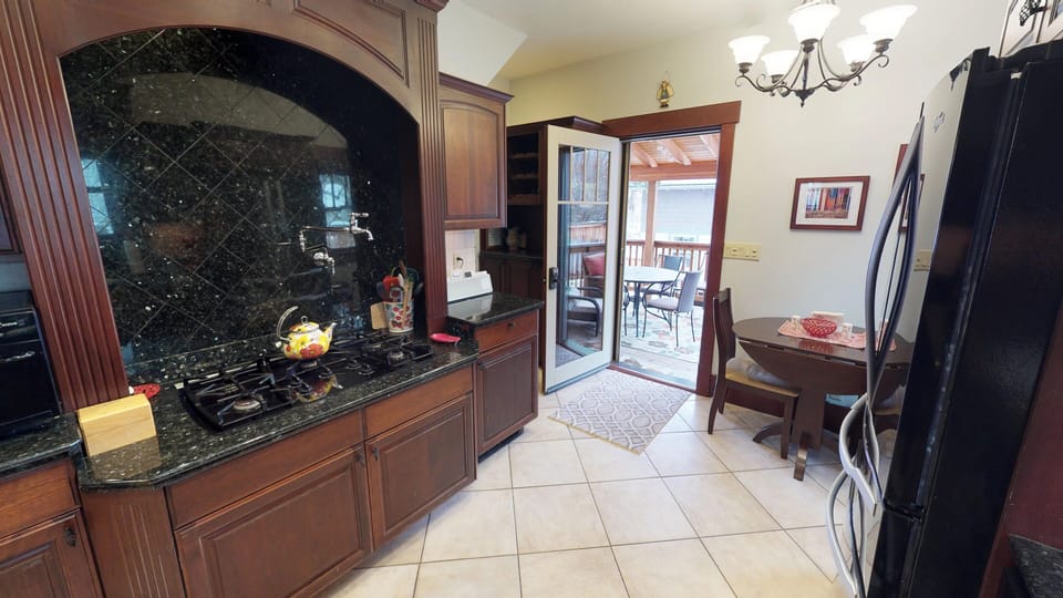 Kitchen access to outdoor deck.
