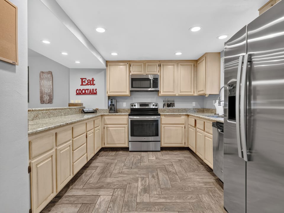 Your fully-equipped kitchen makes preparing meals a breeze, with stainless steel appliances, ample counter space, and everything you need to cook and gather comfortably.