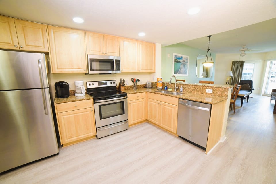 Full kitchen: refrigerator, dishwasher, stove/oven, microwave, coffee makers.  