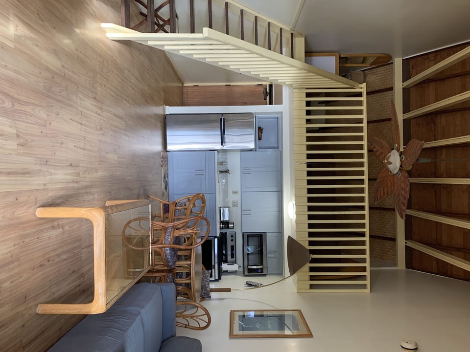 Kitchen, living room, and loft area