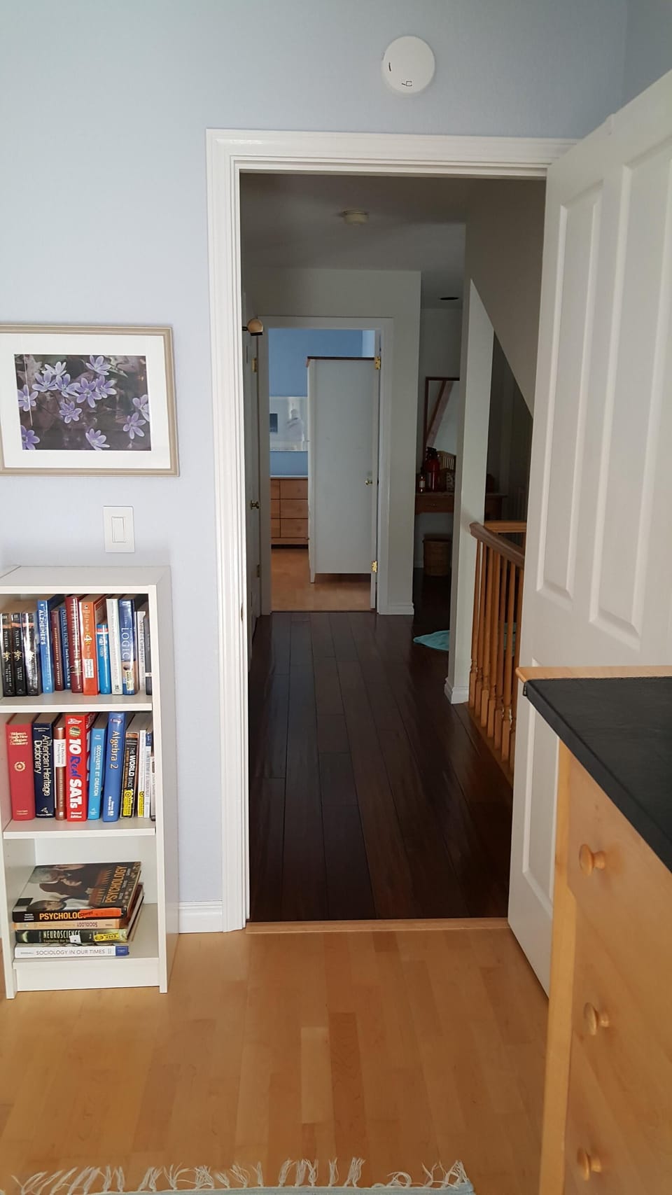 View from back bedroom facing other bedroom. Full bath in hall between these two