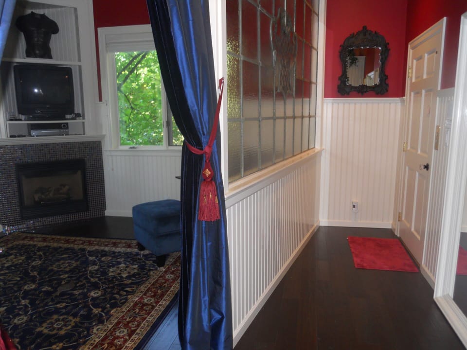 elevator access , closet w/ ironing board and iron, hickory floors.