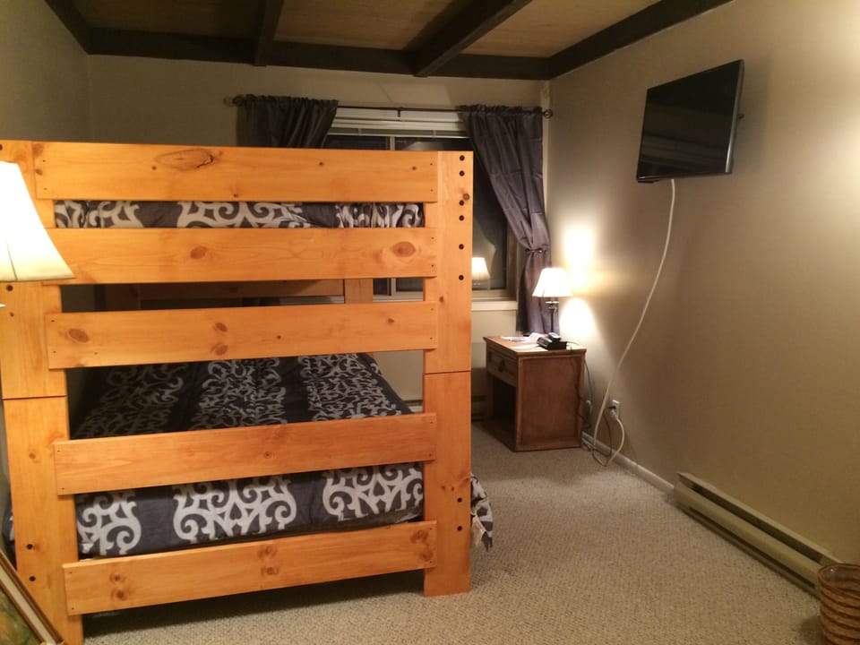 Second bedroom with full over full bunk beds and 32' flat screen TV.