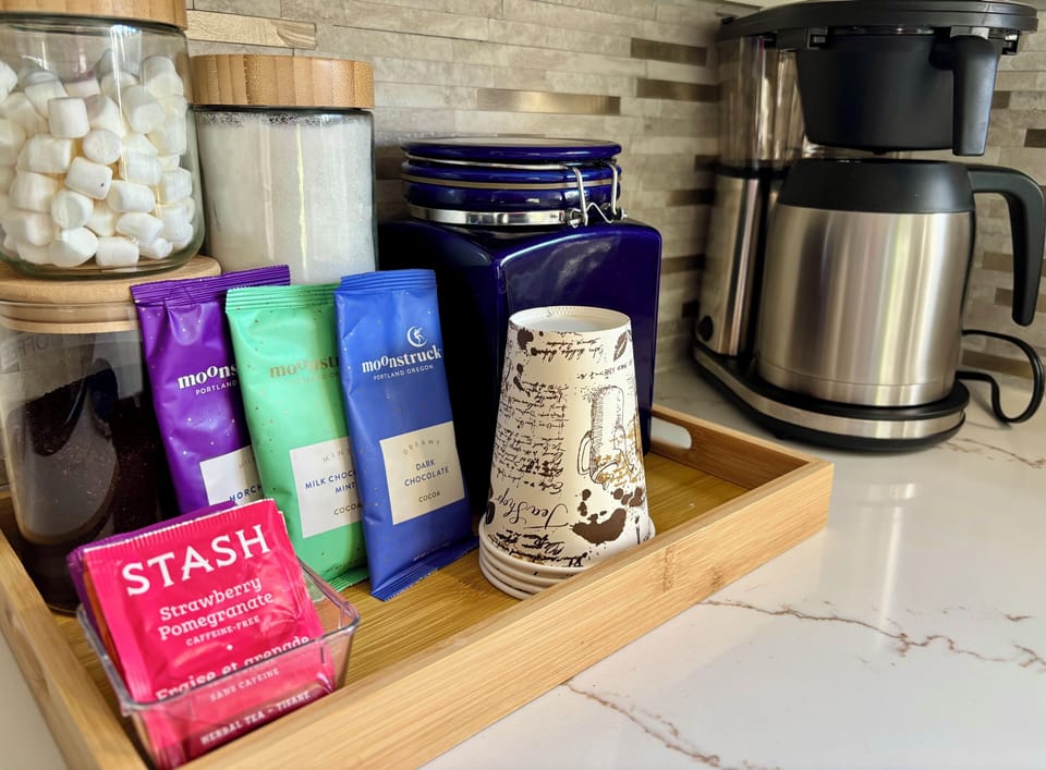 Local tea, coffee, and moonstruck cocoa with pour over coffee maker.