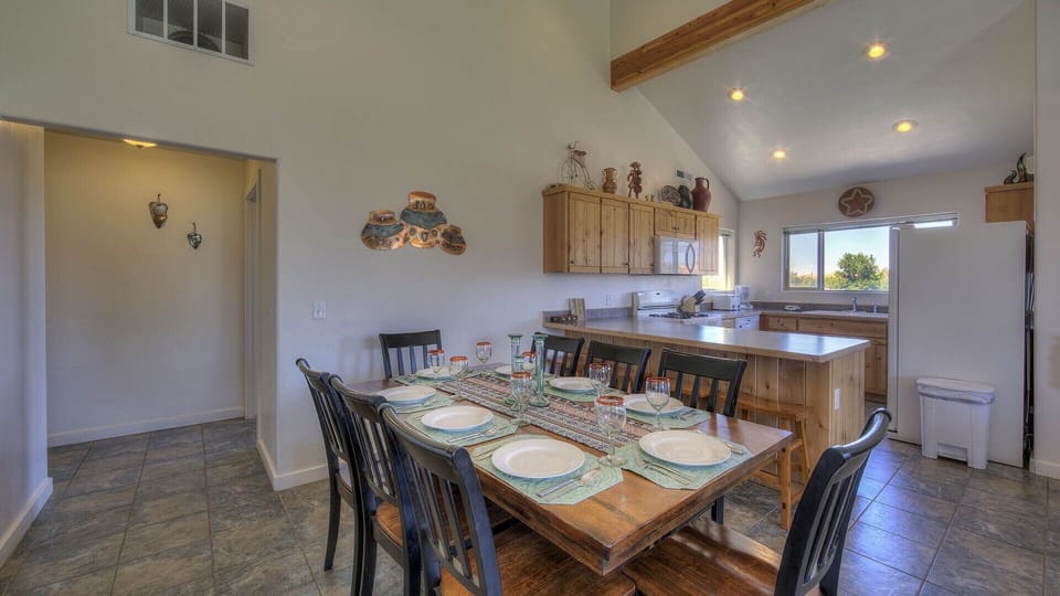 Dining area and kitchen with seating for 4 at the counter