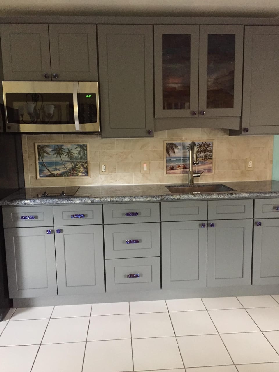 Renovated Kitchen with Custom Mural Tiled Backsplash