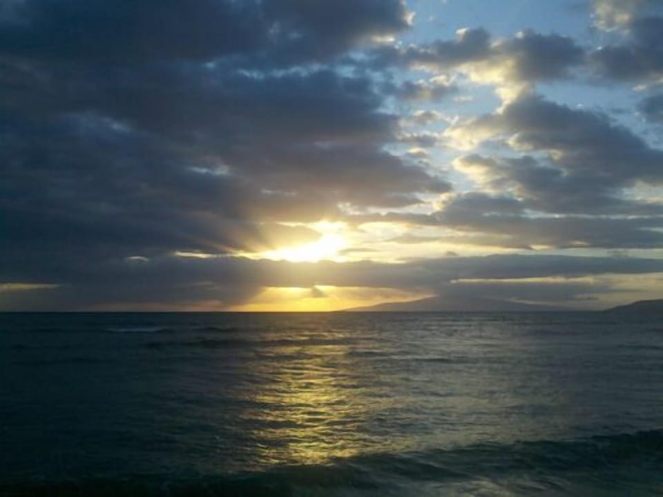 Walk to beach 600 ft from condo each evening to enjoy sunset