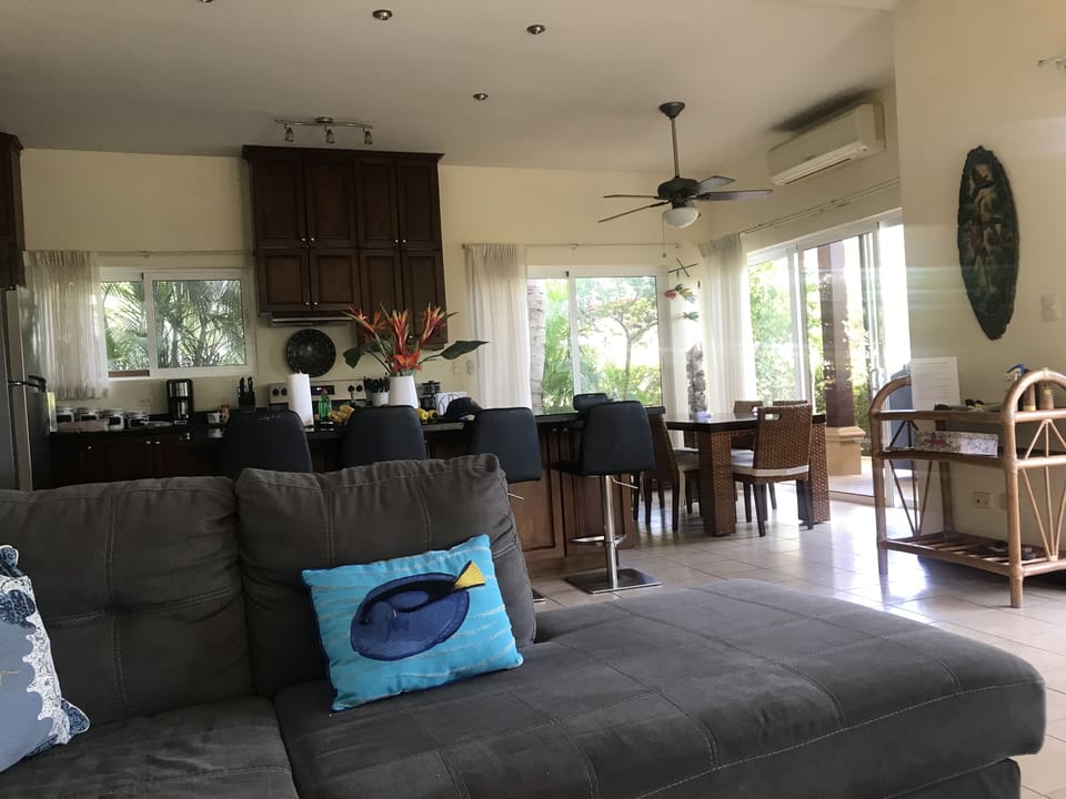 Open concept living, kitchen and dining area. 