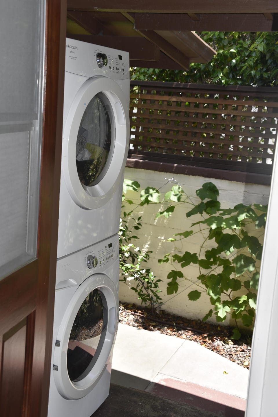 Full size washer/dryer out back, complete with all supplies.
