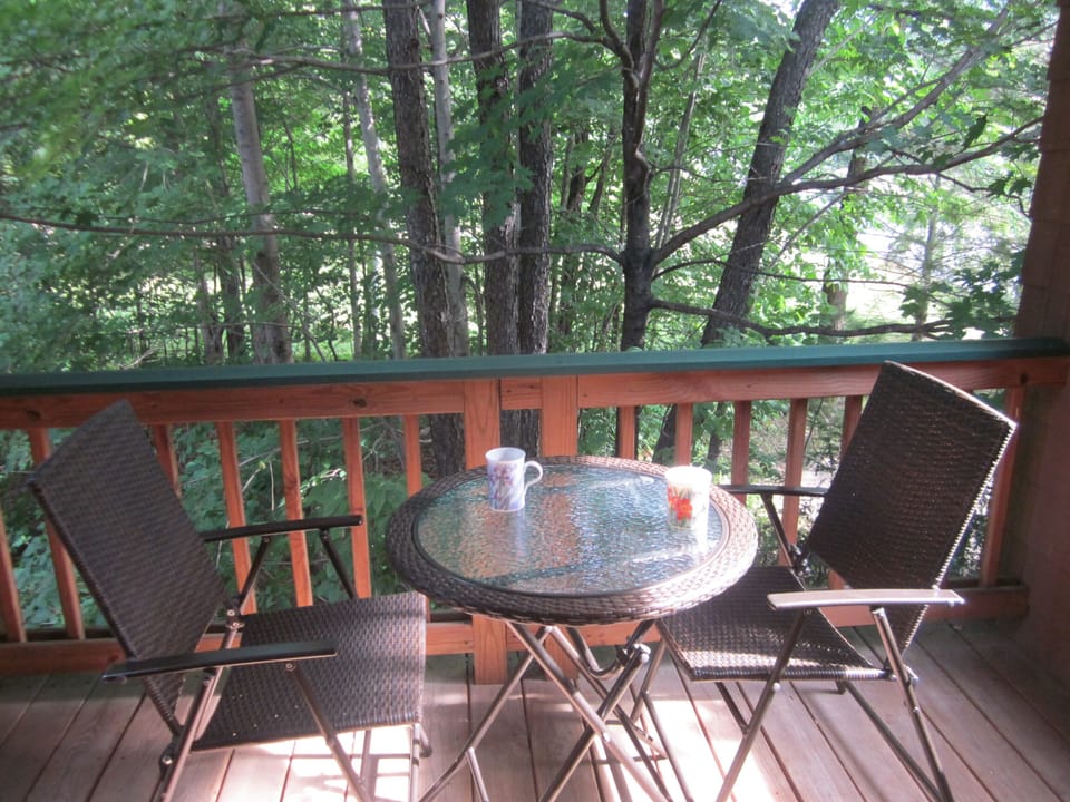 Enjoy a morning cup of coffee out on the secluded and shaded balcony.