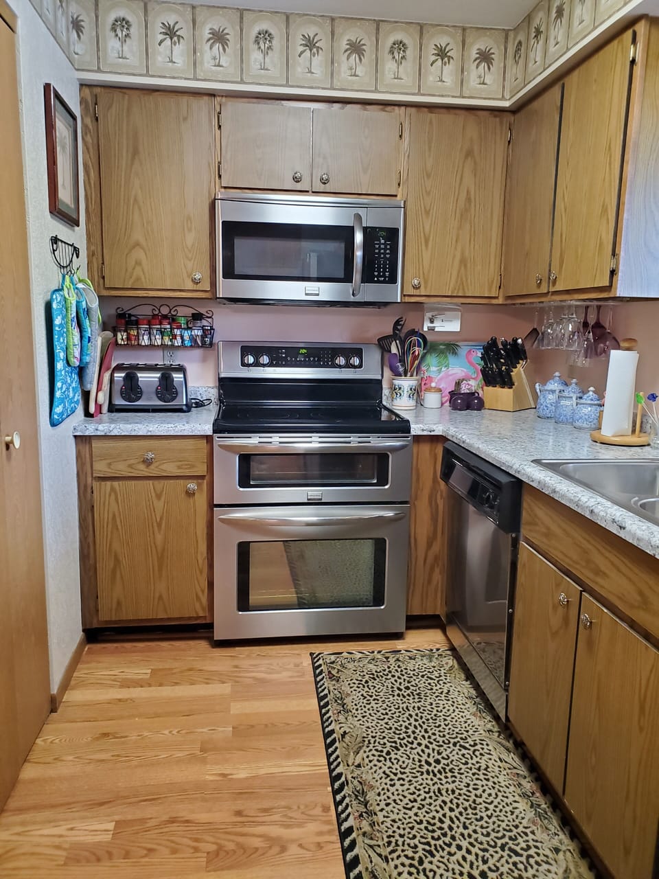 Newly updated Kitchen with new counter top, glass top stove with double oven