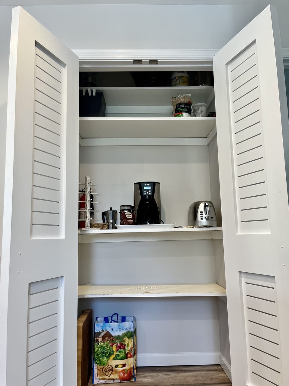 kitchen pantry, coffee maker, toaster 