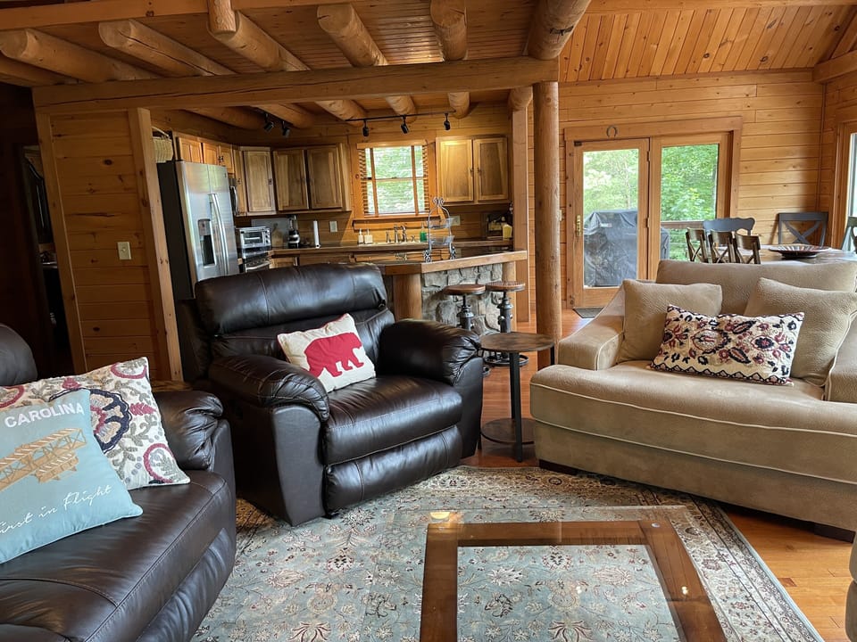 … reclining leather couch and chair and a half, suede chair and a half …