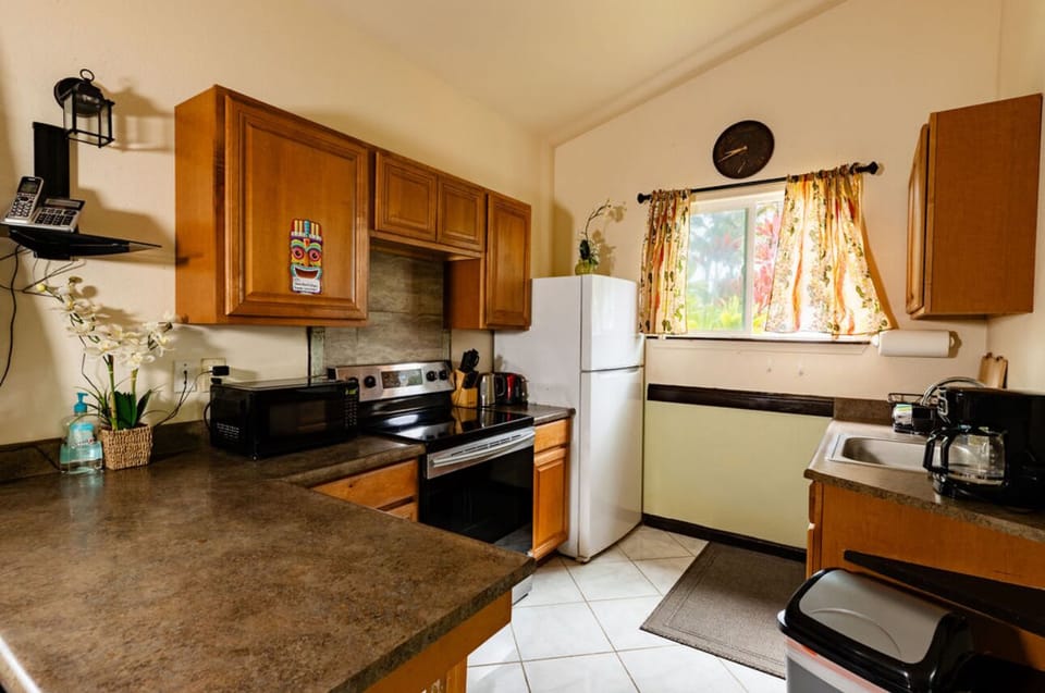 Full kitchen w/ utensils, plates , p and p’s, coffee maker, MW, full oven.