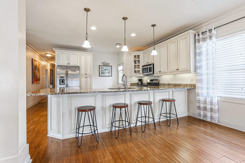 Bar seating at the counter in kitchen