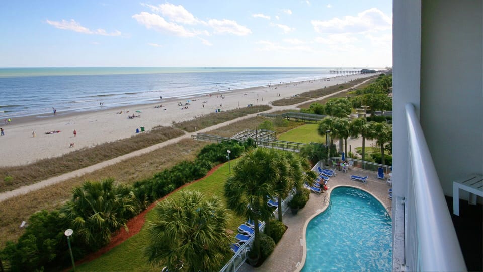 Balcony overlooking ocean/pool!