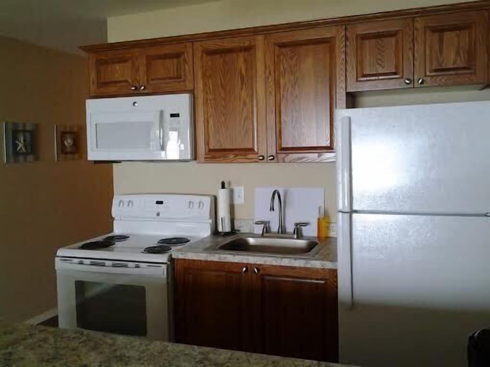 New Kitchen, Full size appliances,  cabinets and floors.  Cook or go out!!!