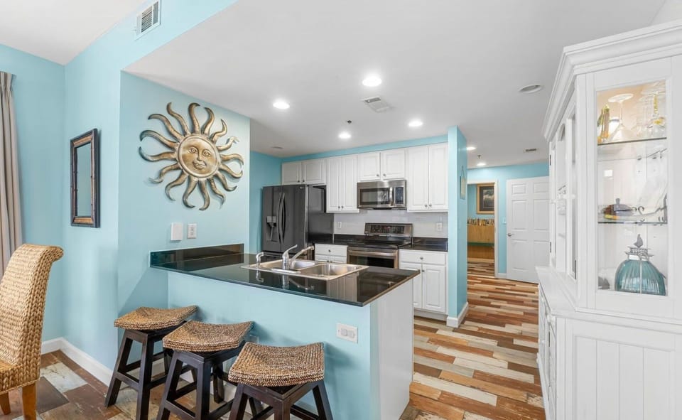 Comfortable Bar Seating and kitchen 