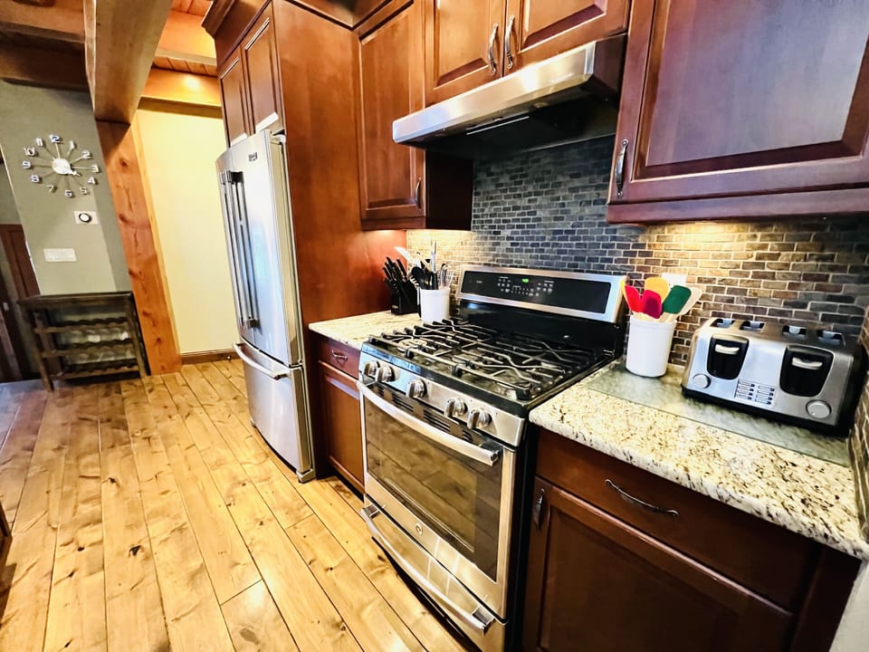 Stainless steel appliances. 5 burner gas stove.