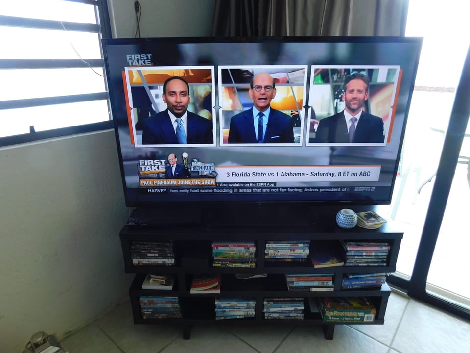 New 55" Smart TV with many DVDs