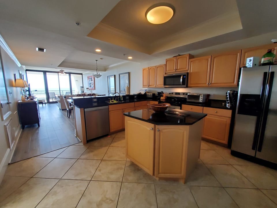 Kitchen and den.