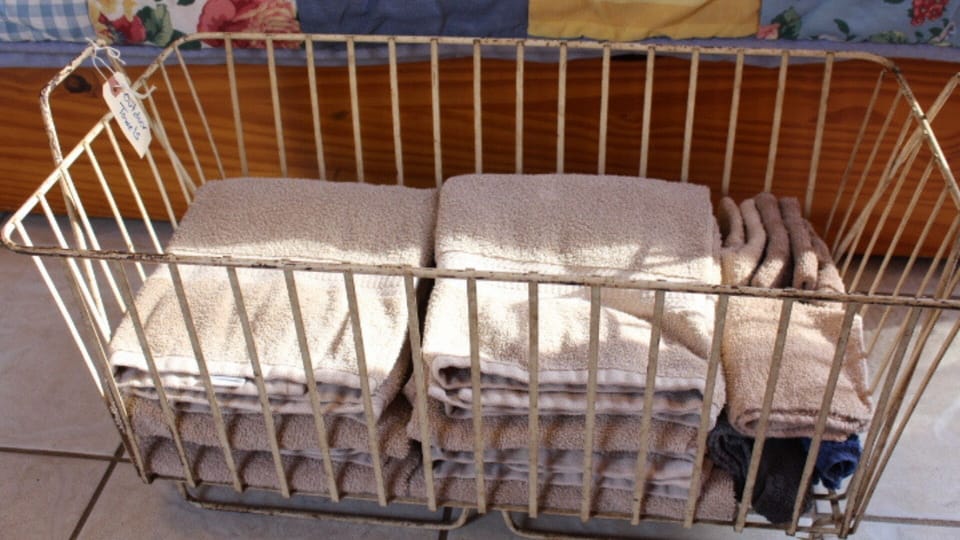 "Outdoor Towels" to wipe down benches and rockers to keep our bath towels clean.