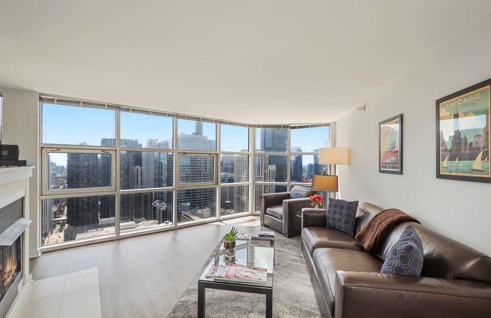 Living room with gas fireplace and queen sleeper sofa