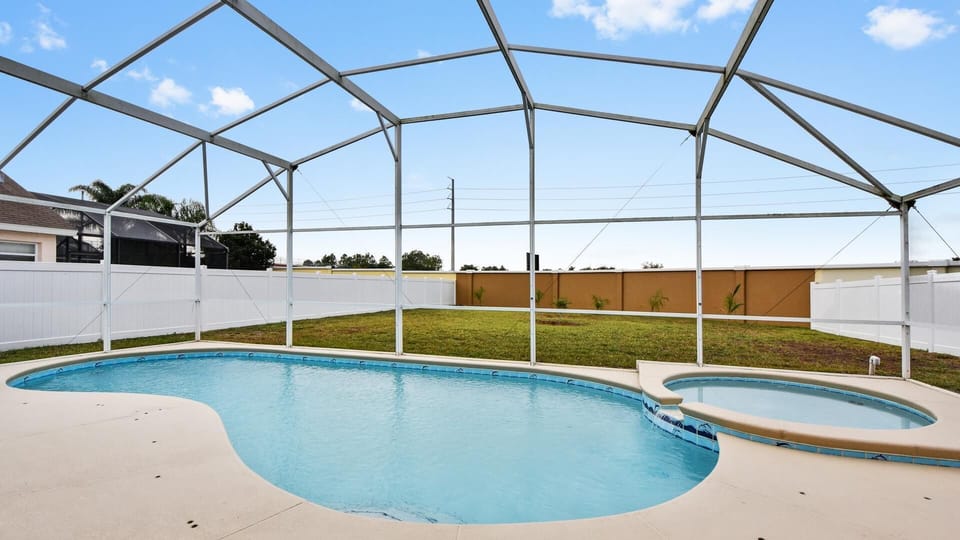 Large South facing pool with large backyard , fully fenced 