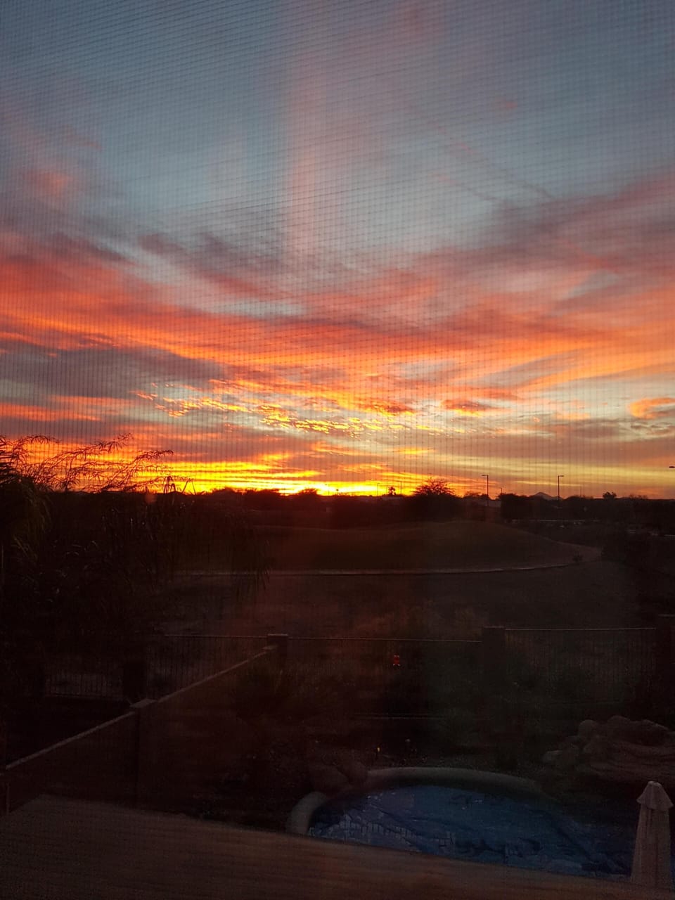 Enjoy beautiful sunsets from the back patio and Media Room.