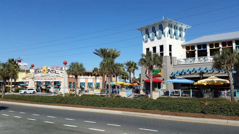 Entrance to Pier Park from Front Beach Rd; about 6 miles away.