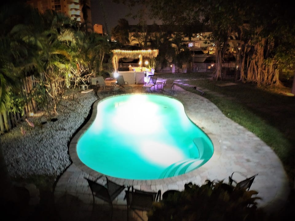 Pool at night with new tiki hut/tiki bar