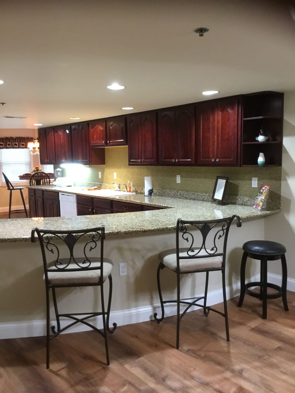 Cherry cabinets in kitchen.