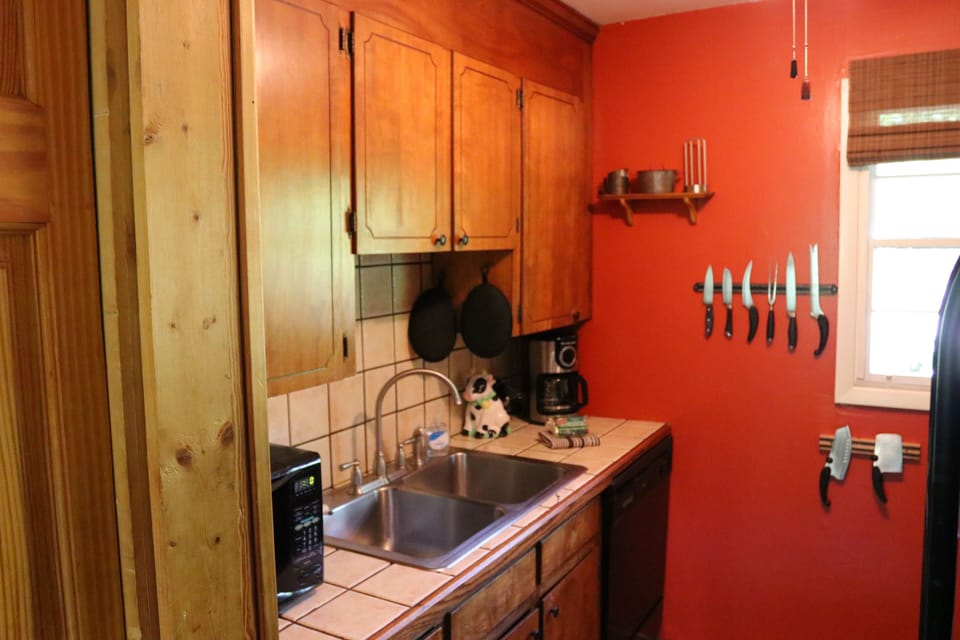 Galley Kitchen includes Microwave, Drip & Pod Coffee Makers, and Dishwasher