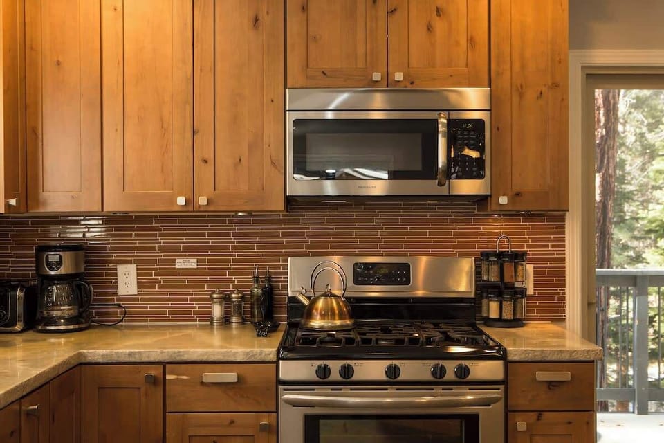 Spices, oil, vinegar and more provided in the ready to entertain kitchen