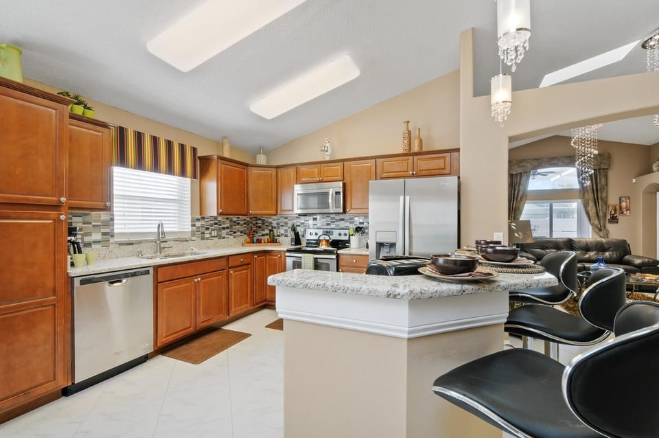 Brand new kitchen with stainless steel appliances 
