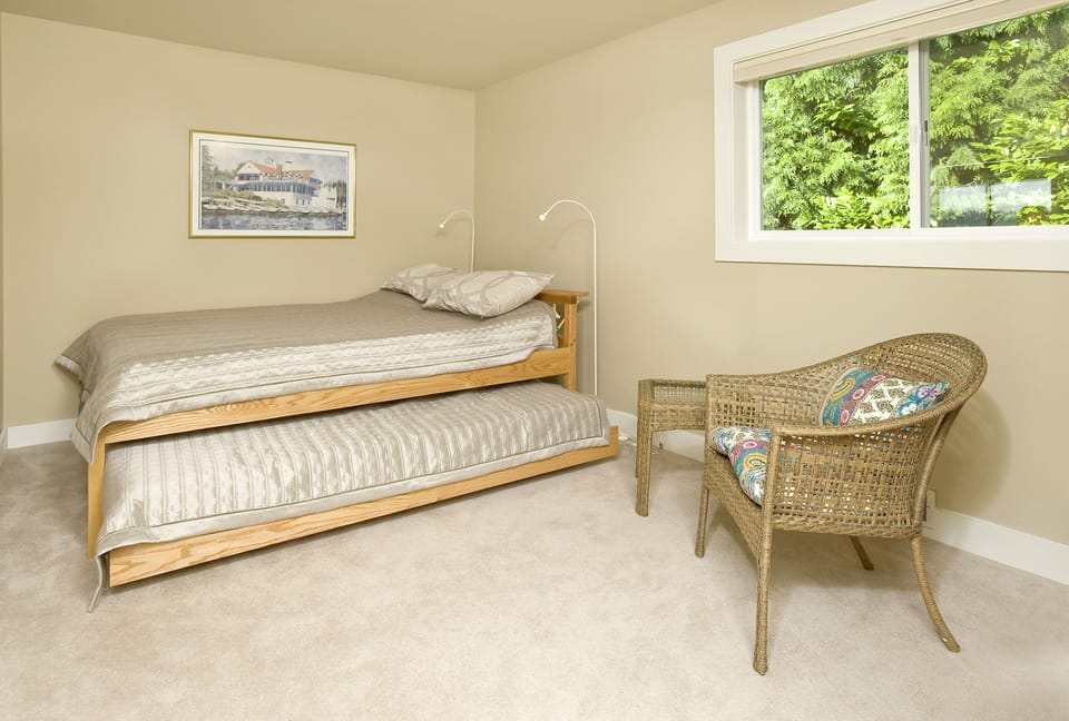 On the second room, there are two queen size beds (one slides out)