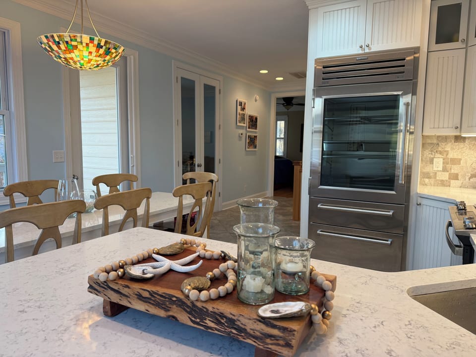 Your second-story, open kitchen— water-views and quartz countertops included!