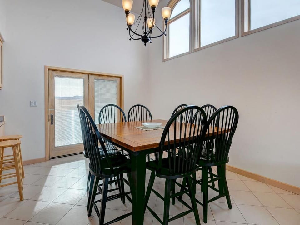 Seating for 20! (8 at the table, 6 bar stools, and 6 at extra folding table) 