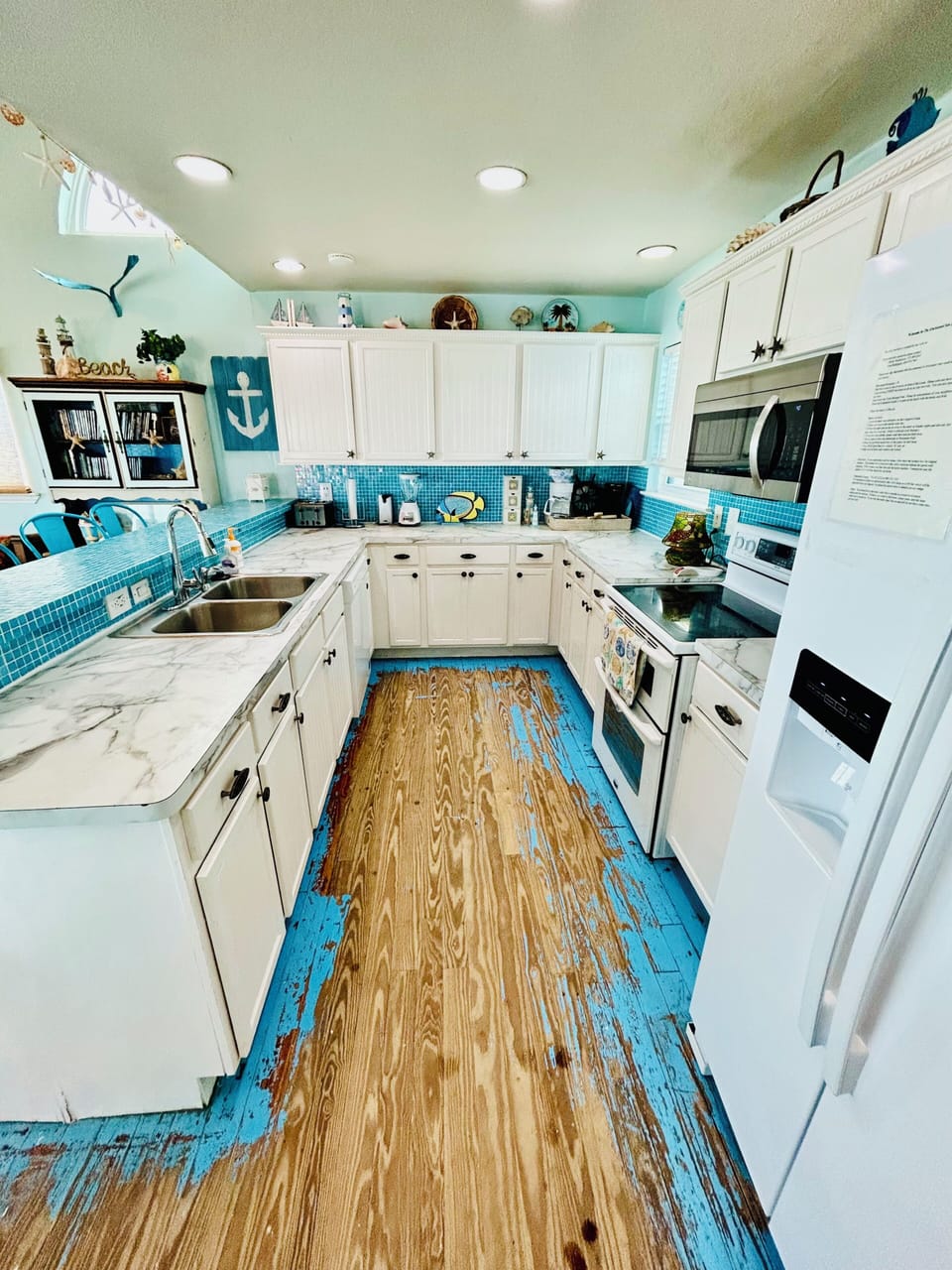 Side-by-side refrigerator, double oven, and custom cabinets!
