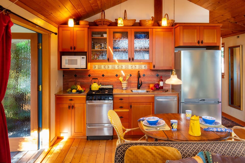 the Pullman type kitchen, pine floors,hand blown glass fixtures