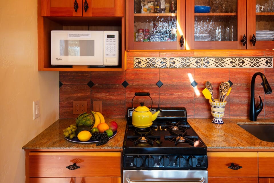 granite counter tops, tiled back splash