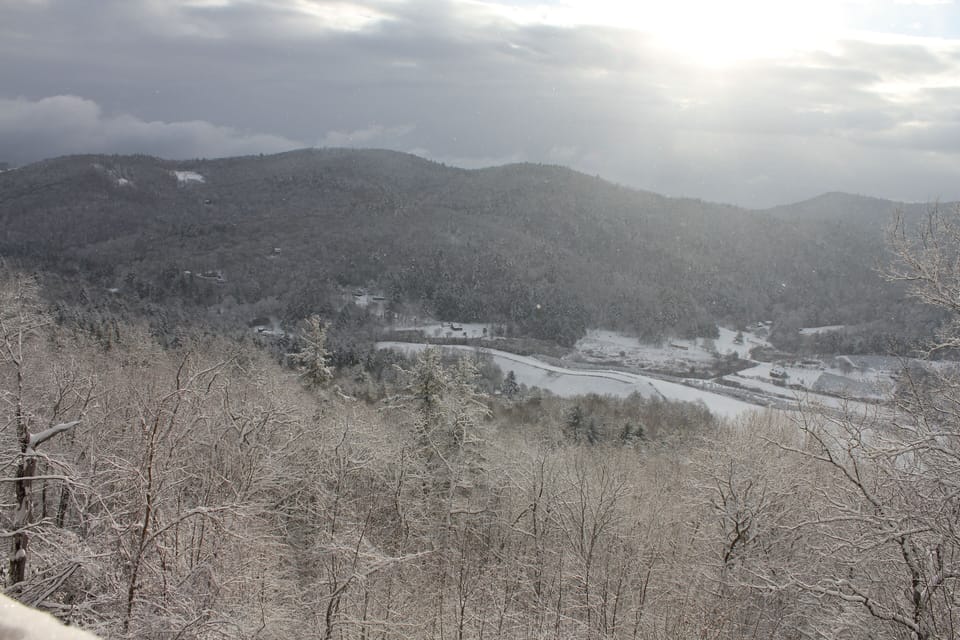 Snow in valley below