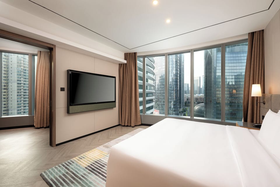 Down comforters, free minibar, in-room safe, desk