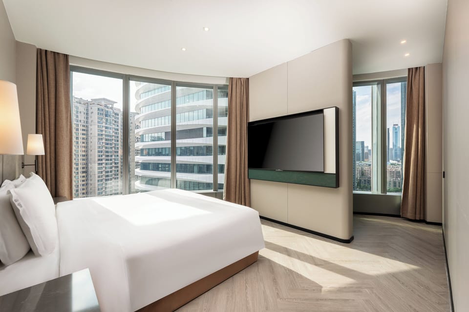 Suite, 2 Bedrooms | Down comforters, free minibar, in-room safe, desk